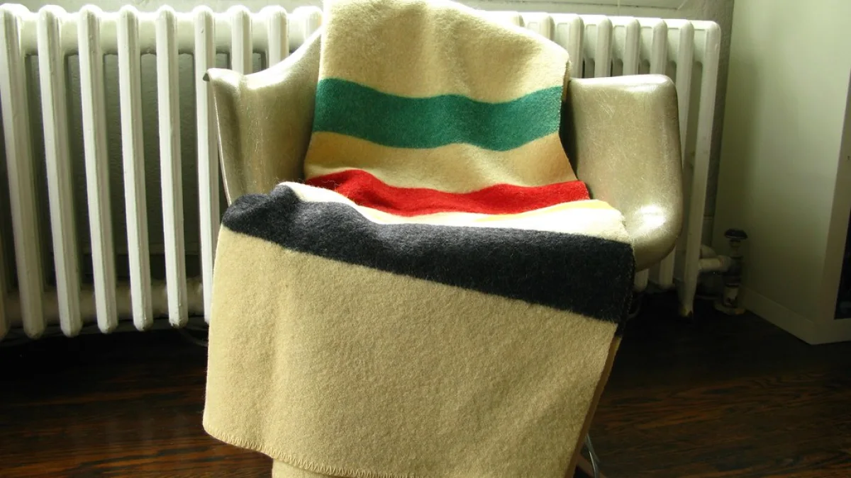 Folded woven wool blanket showing its texture